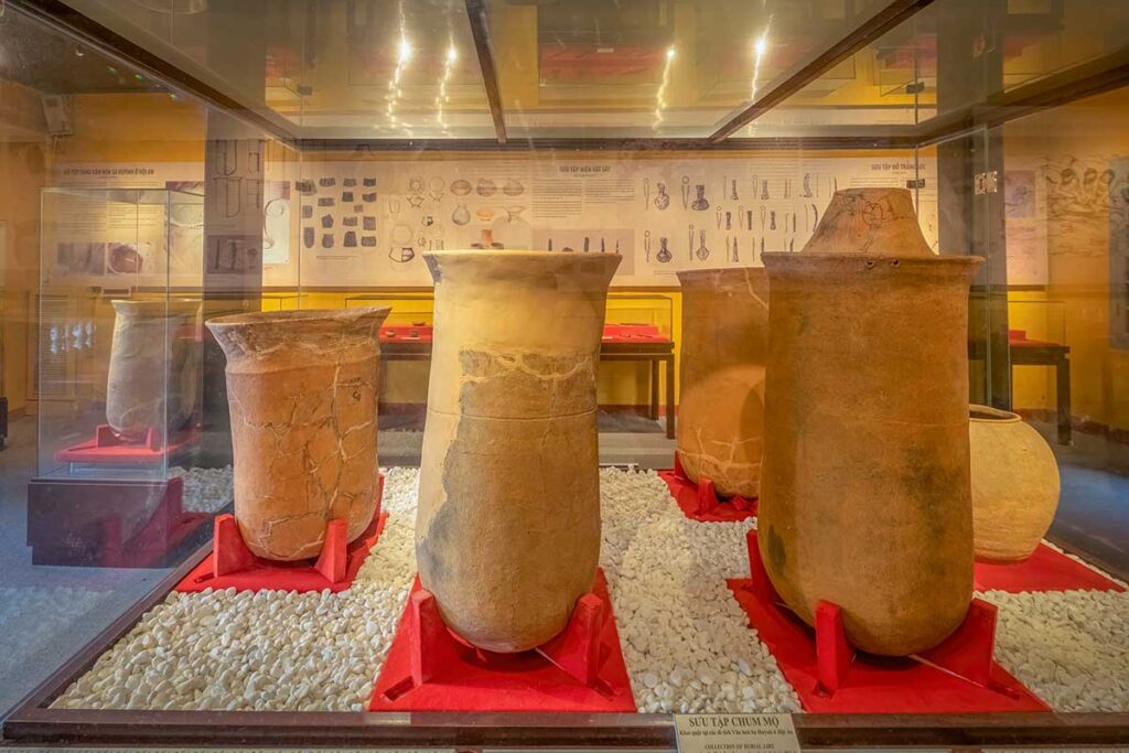 Large burial jars on display at Hoi An Museum of Trade Ceramics – Sa Huỳnh culture artifacts that reveal ancient burial traditions in Central Vietnam.