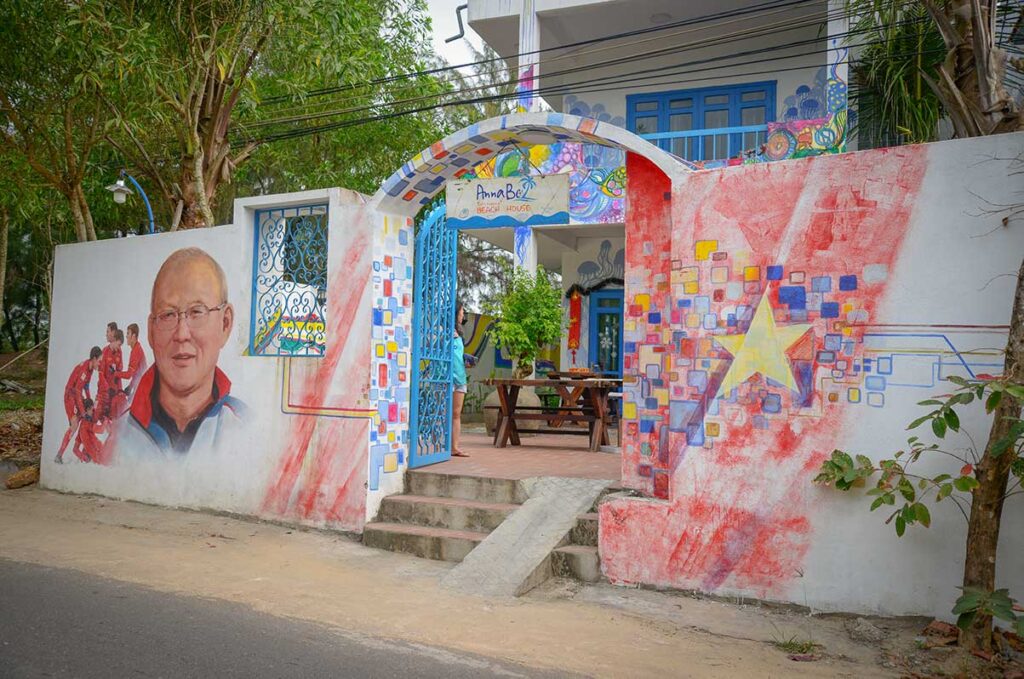 Street art of Vietnam’s national football coach painted on a house in Tam Thanh Mural Village.