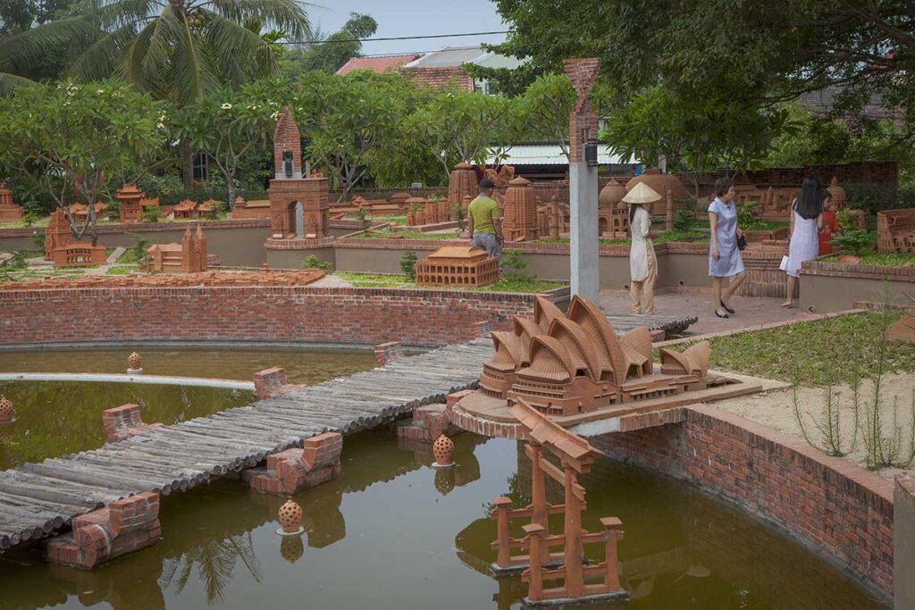 Miniature clay architecture models at Thanh Ha Terracotta Park, including iconic landmarks recreated in terracotta