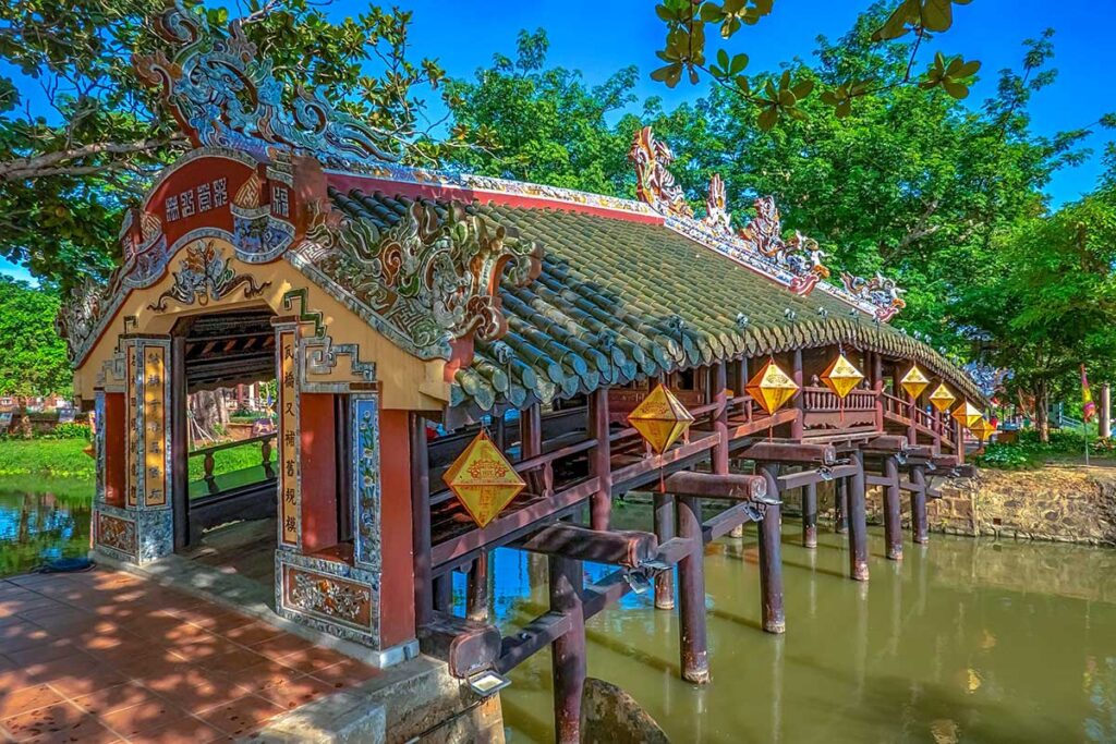 The Thanh Toan Bridge stretching over a small canal