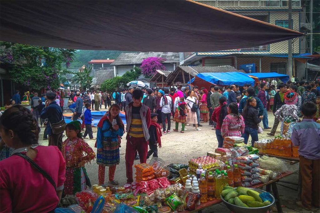 Local ethnic people are selling goods on Son Vi Market in Meo Vac Disitrct