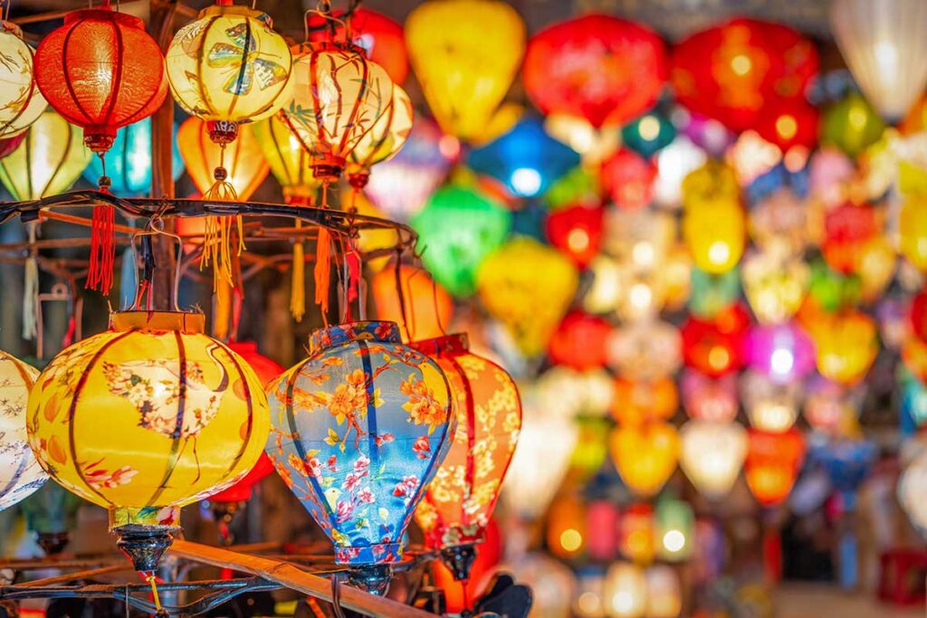 Colorful silk lanterns for sale in a Hoi An souvenir shop, a popular gift and symbol of the ancient town.