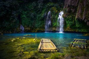 Chieng Khoa Waterfall with a bamboo raft