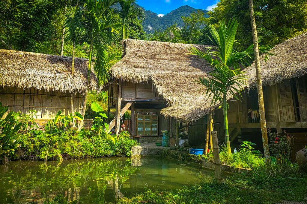 Traditional stilt houses made of wood, bamboo and palm leaves of Hieu Village in Pu Luong