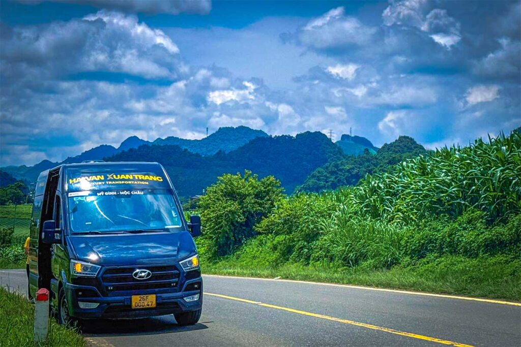A limousine parked on a highway that drives from Hanoi to Moc Chau