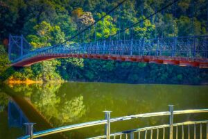 A small steel bridge connecting the main land with an island in Pa Khoang Lake (Dien Bien Phu)
