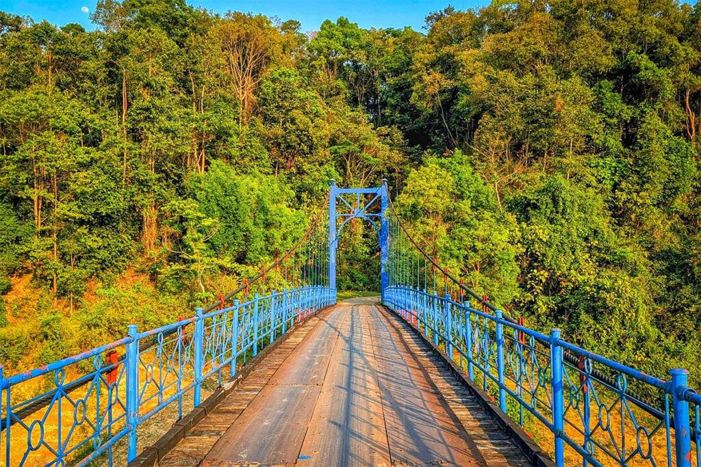 A steel bridge crossing Pa Khoang Lake