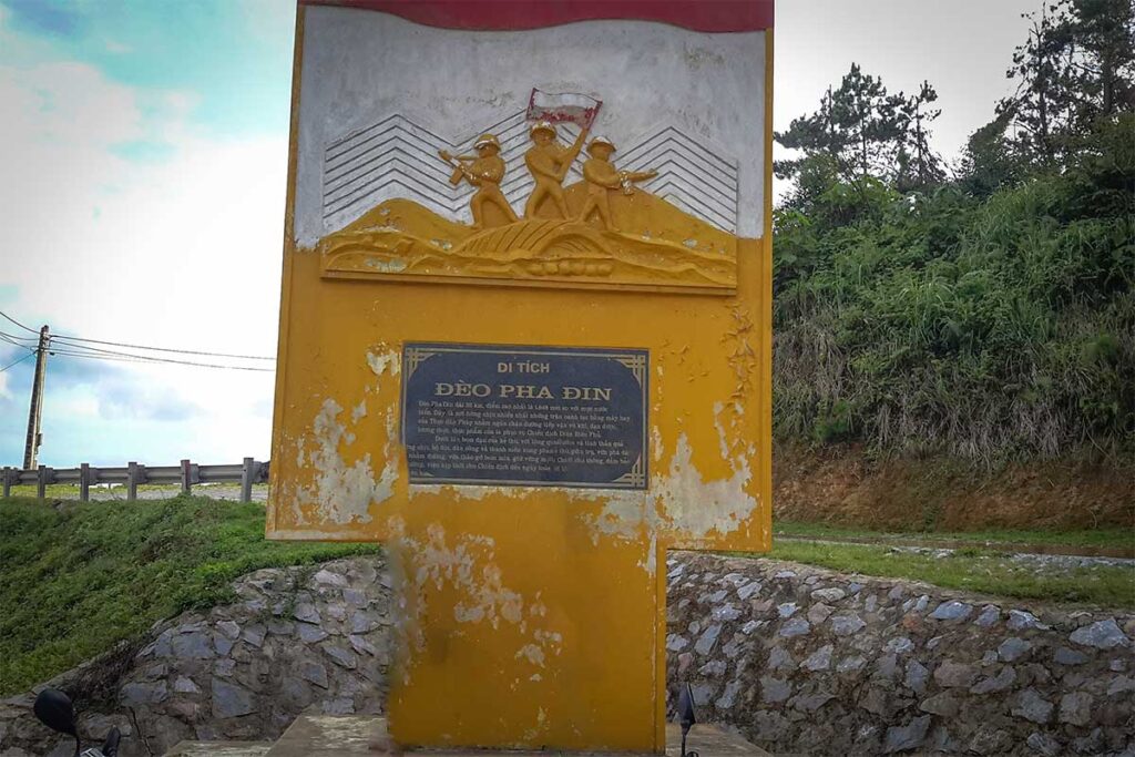 An historical marker on Pha Din Pass remembering how the pass was used during the Battle of Dien Bien Phu