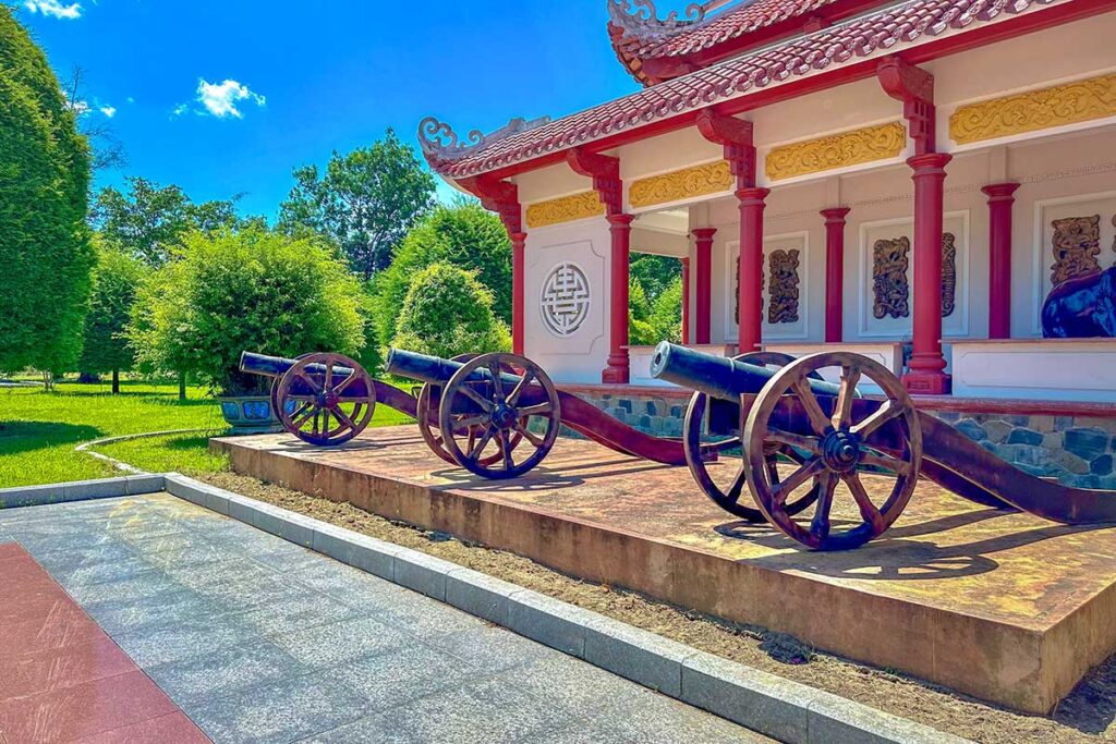 Restored cannons displayed in the courtyard of Quang Trung Museum in Binh Dinh, representing the weaponry used during the Tay Son uprising.