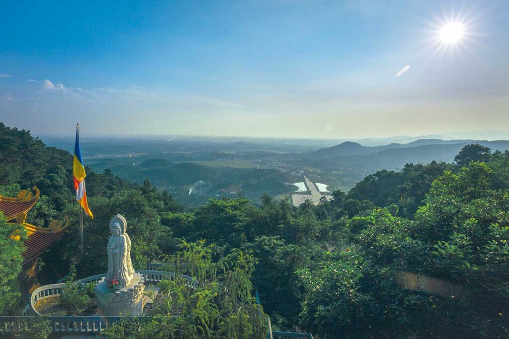 View over the forests and temple halls seen from the top of Tay Thien Pagoda complex
