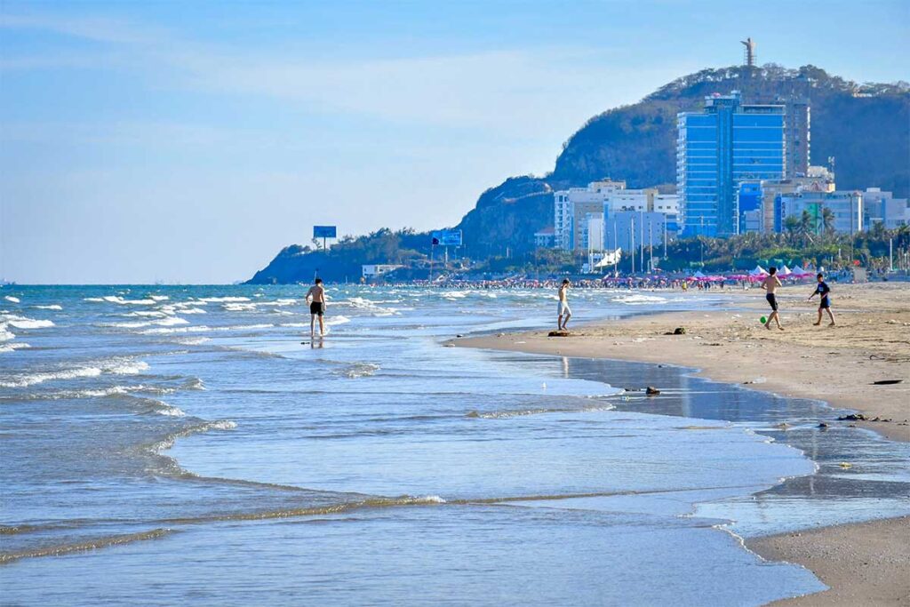 Locals hanging out on the long stretch of sand called Bach Beach (Bai Sau) in Vung Tau