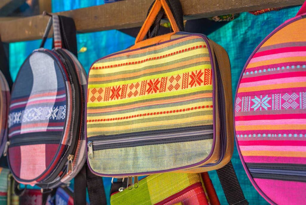 Colorful bags made by the minorities in Chau Giang Cham Village to sell as souvenirs