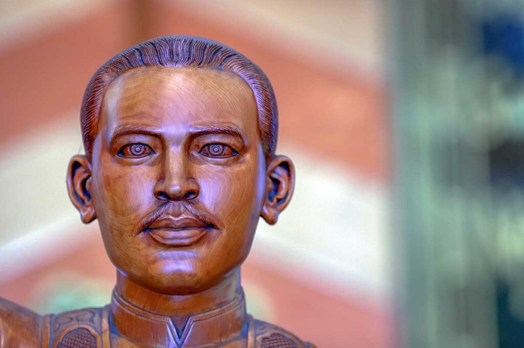 Closeup of the face of Father Truong Buu Diep statue displayed at Tac Say Church