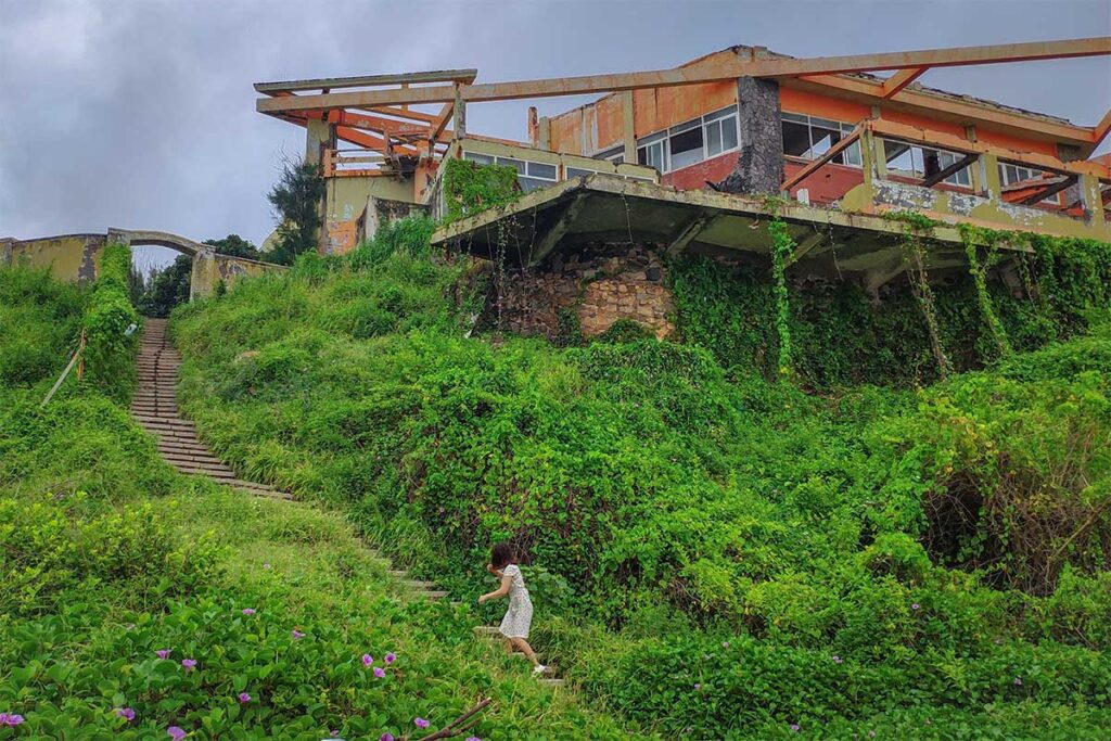 An abandoned house with concrete wall at Nghinh Phong Cape