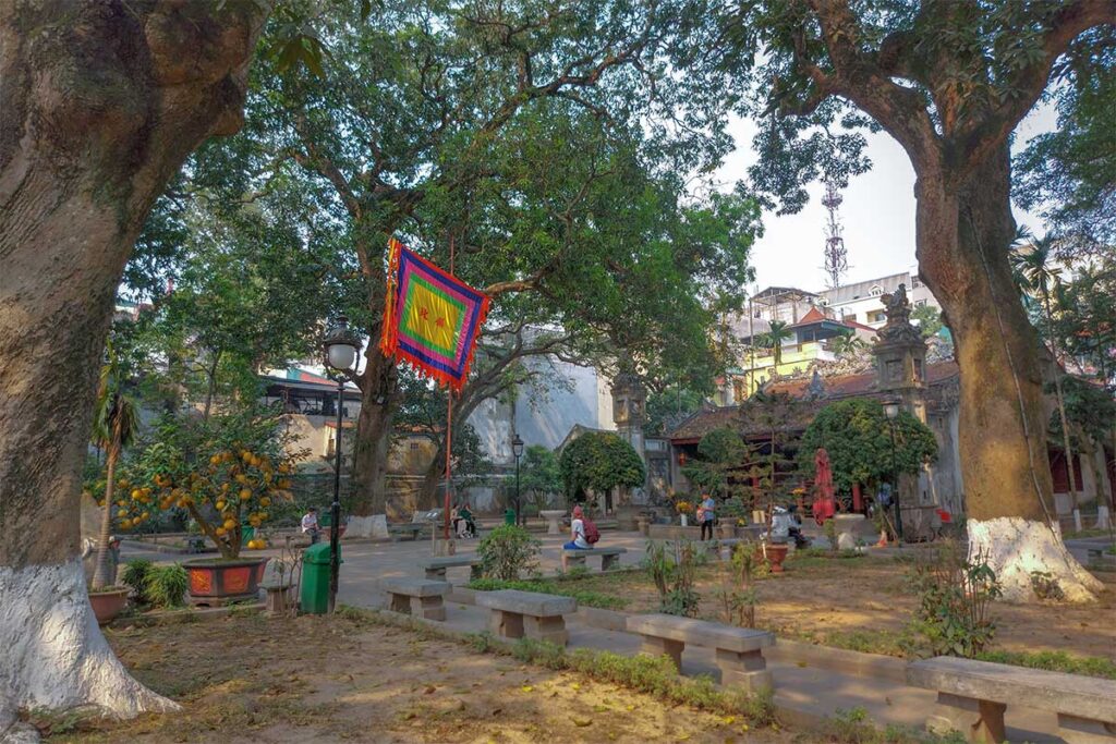 Courtyard area with trees of Quan Thanh Temple