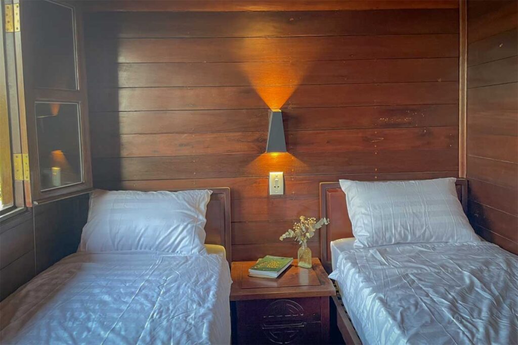 Homestay accommodation on Con Son Islet with simple wooden rooms for overnight stays