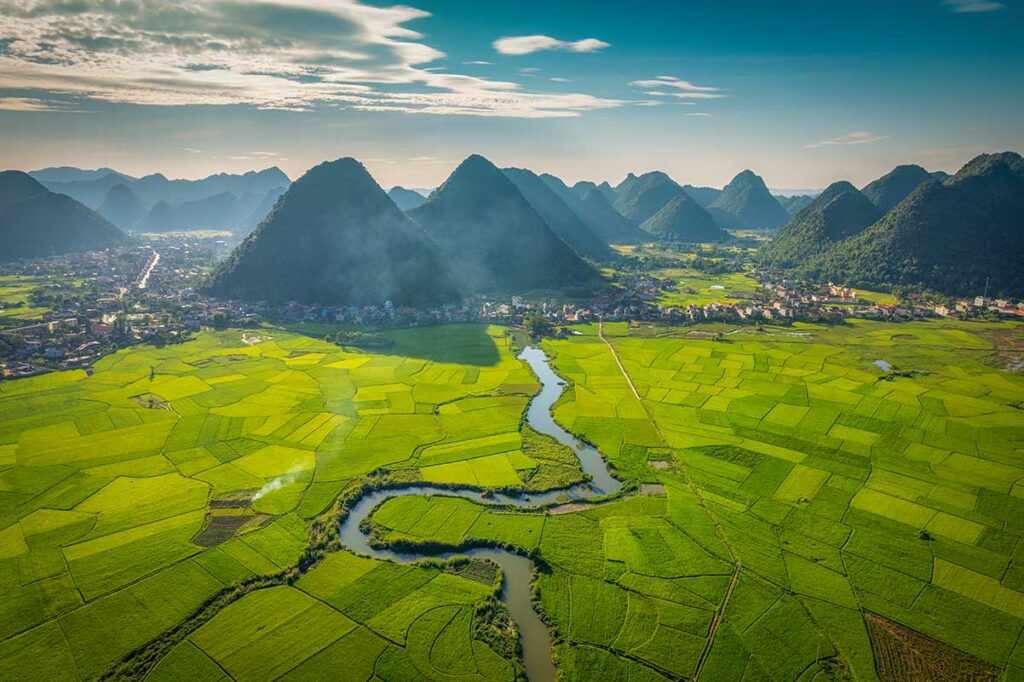 Bac Son Valley Lang Son – Local Vietnam | sunrise over green rice fields and limestone mountains in northern Vietnam