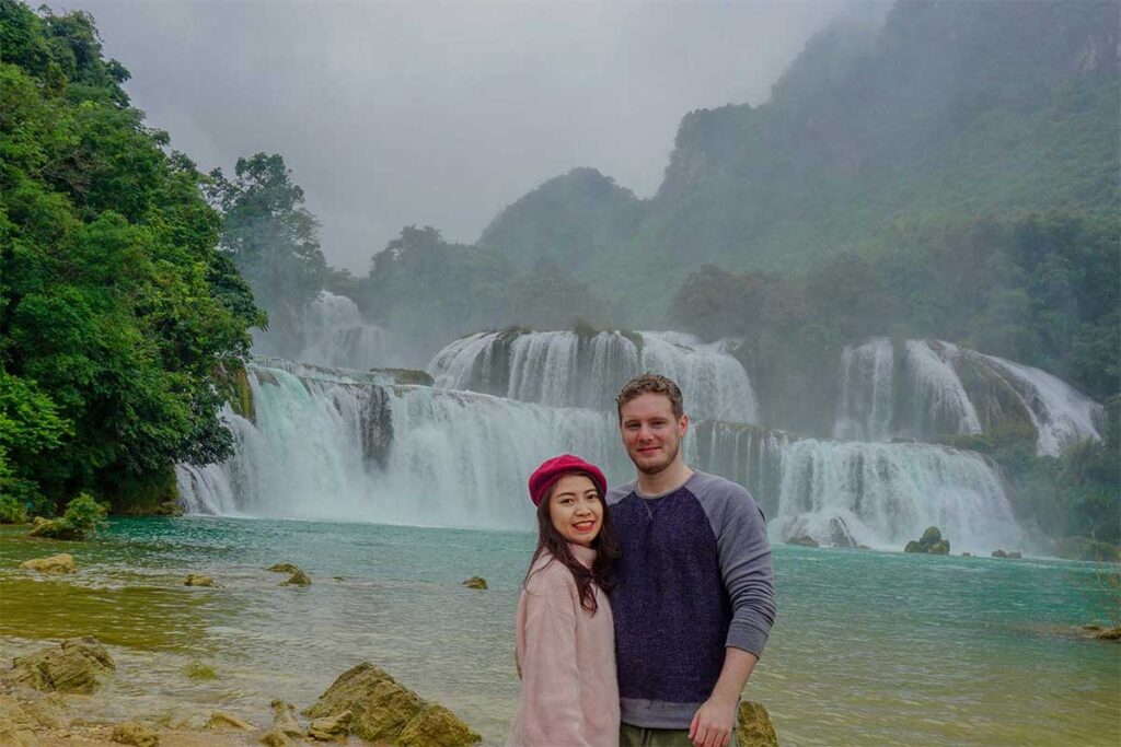 Marnick Schoonderwoerd and Nhung Phung from Local Vietnam visiting Ban Gioc Waterfall in Cao Bang, Vietnam
