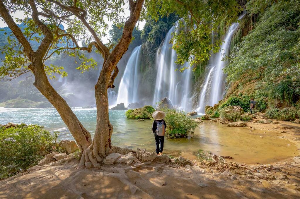 Ban Gioc Waterfall in Cao Bang – authentic Vietnam tours by Local Vietnam | local traveler admiring the falls