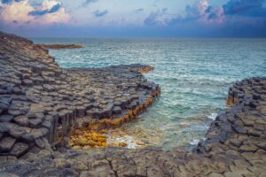Close view of interlocking basalt columns at Da Dia Reef, Sea Cliff of Stone Plates, in central Vietnam.