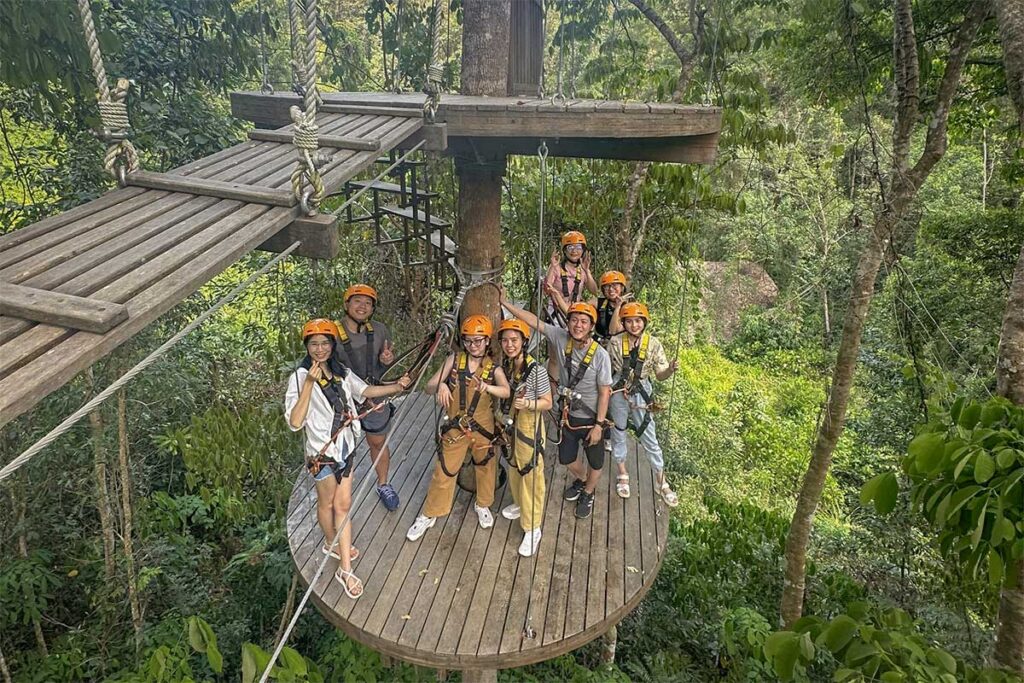 Group of visitors preparing for an adventure on the treetop platforms at Kong Forest Nha Trang, Hon Ba Nature Reserve – popular for zipline and outdoor activities.