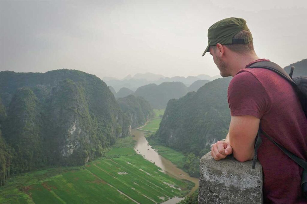 Marnick Schoonderwoerd from Local Vietnam overlooking the Tam Coc valley from Mua Cave viewpoint in Ninh Binh, Vietnam