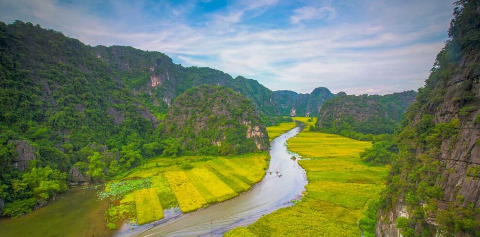 Ninh Binh Vietnam – Local Vietnam tours | aerial view of Tam Coc river winding through rice fields and karst mountains
