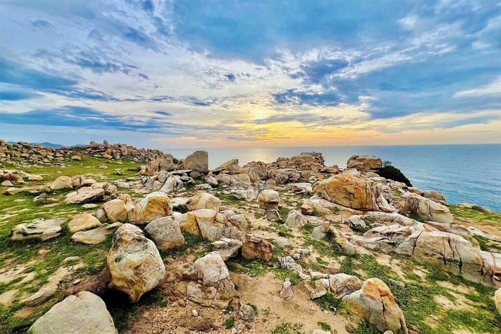 Stone Park in Nui Chua National Park, Ninh Thuan – surreal rock formations scattered along the coastline at sunset.