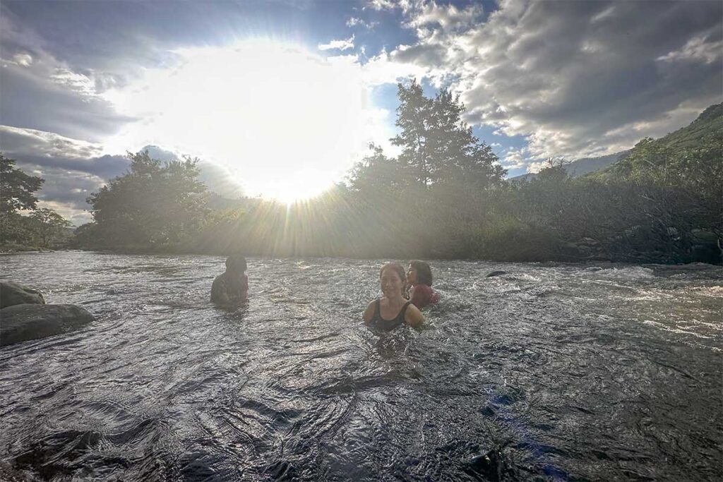Swimming in Phuoc Binh river – Travelers bathing in a refreshing mountain stream at Phuoc Binh National Park, Ninh Thuan.