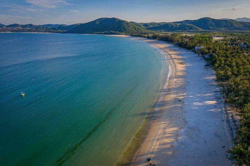 Aerial view of Tu Nham Beach, Phu Yen, showing the sweeping bay and quiet coastline.