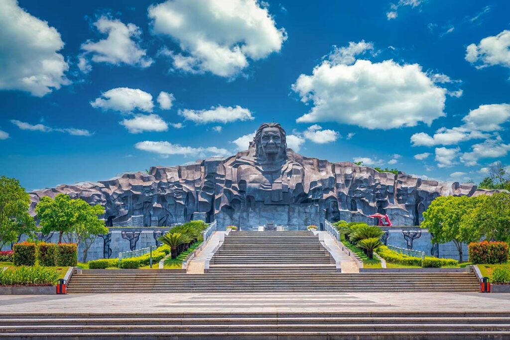 Monumental mountain-shaped sculpture of the Vietnamese Heroic Mother Statue in Tam Ky, honoring maternal sacrifice during Vietnam’s wars.