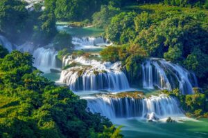 The cascading Ban Gioc Waterfall near the Chinese border — one of the most spectacular natural sights included in northern Vietnam tours.