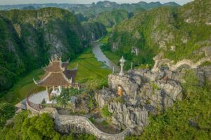Panoramic view from Hang Mua Peak over limestone mountains and rice fields in Ninh Binh — a highlight of our 10-day Vietnam itinerary exploring Hanoi, Ninh Binh, and Hoi An.