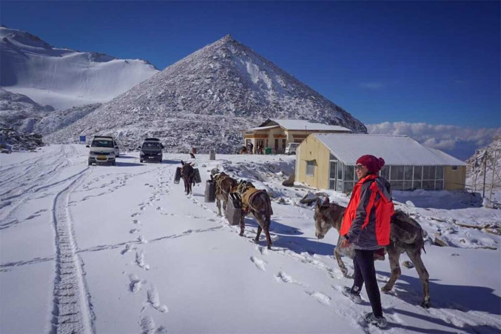 Nhung Phung exploring the snowy passes of Ladakh, India — reflecting her wide travel experience across Asia and her deep passion for authentic, cultural exploration that shapes Local Vietnam’s tours.