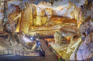 Majestic stalactites and stalagmites inside Phong Nha’s Paradise Cave — one of the most impressive natural wonders to explore on a Vietnam tour.