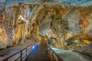 Illuminated walkway through the massive Paradise Cave in Phong Nha-Ke Bang National Park — a breathtaking destination featured in many Vietnam itineraries.