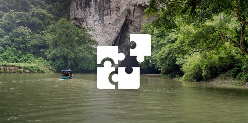 Private Ba Be Lake tour with a tailor-made itinerary, exploring calm river scenery, limestone cliffs, and lush jungle.