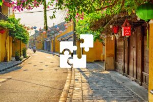 Private Hoi An tour with a personalized itinerary, exploring lantern-lit ancient streets and charming yellow heritage houses.
