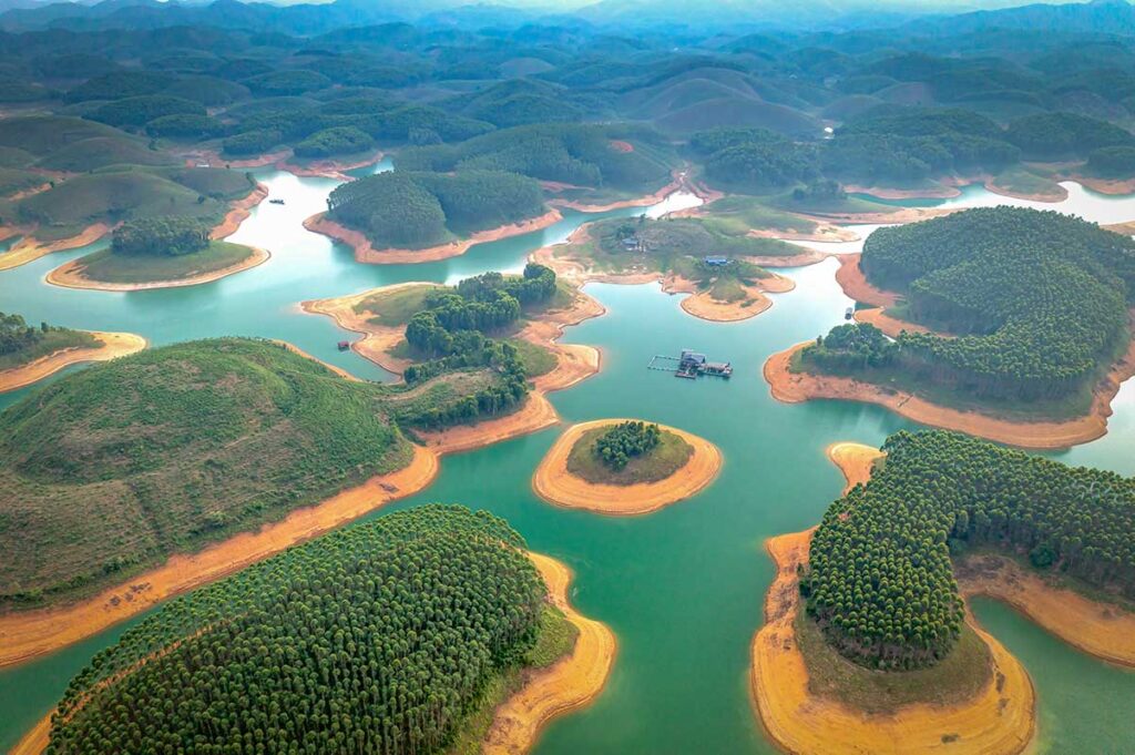 Thac Ba Lake tours with aerial views of emerald islands and winding waterways in Yen Bai