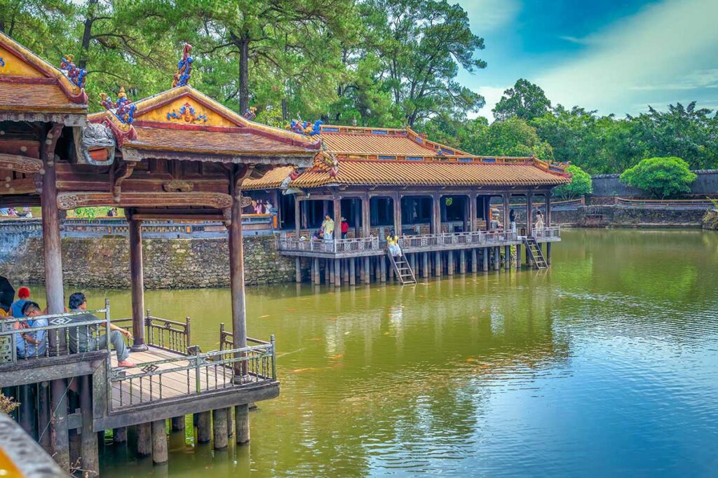 Tu Duc Tomb tours with the lakeside wooden pavilion inside the Hue royal complex