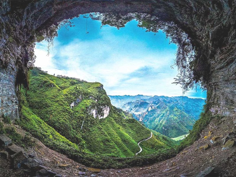 A huge hole in a cliff, creating a natural window called the Eye of Ma Pi Leng Pass in Ha Giang