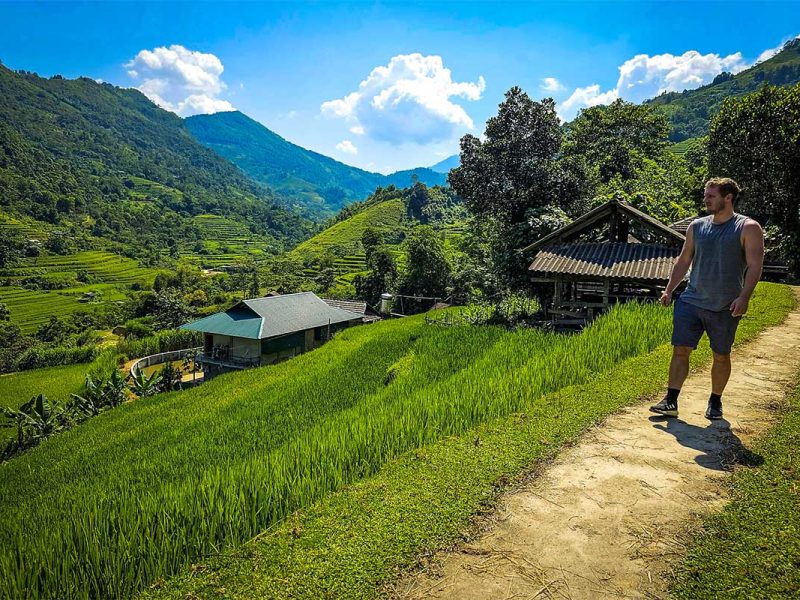 hoang su phi trekking tour 1 A tourist doing a Hoang Su Phi trekking tour through the terraced rice fields