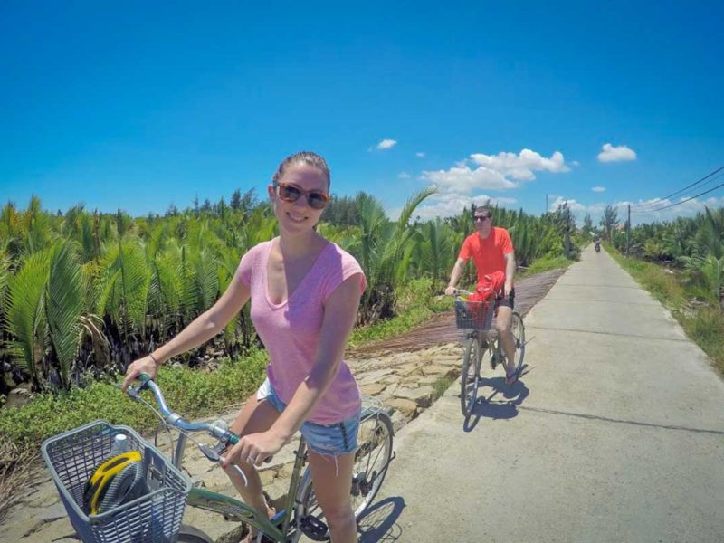 hoi an kayaking cycling tour mangrove countryside 4 Cycling along a quiet countryside path lined with nipa palm trees on the Hoi An Kayaking & Cycling Tour