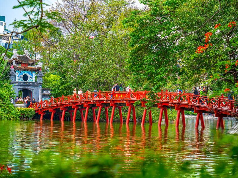 The red Huc Bridge at Hoan Kiem Lake in Hanoi