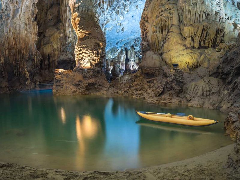 Kayaking on a underground river inside Phong Nha Cave - Part of Phong Nha National Park - Vietnam