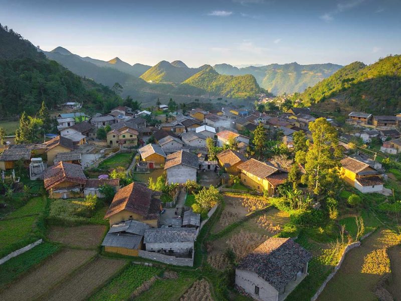 lo lo chai village ha giang 1 Aerial view of Lo Lo Chai Village – A traditional village with beautiful yellow clay houses of the Lo Lo ethnic group, surrounded by Ha Giang’s rugged mountains.