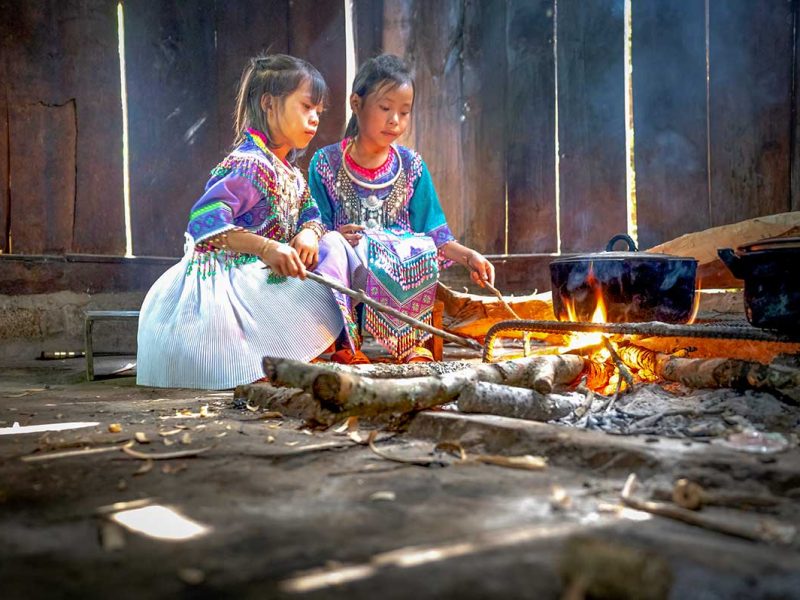 mu cang chai ethnic minority children 1 Ethnic minority children in Mu Cang Chai cooking over an open fire inside a traditional house