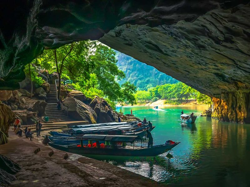 phong nha cave boat tour 3 Boats parked inside Phong Nha Cave