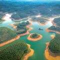 Thac Ba Lake tours with aerial views of emerald islands and winding waterways in Yen Bai